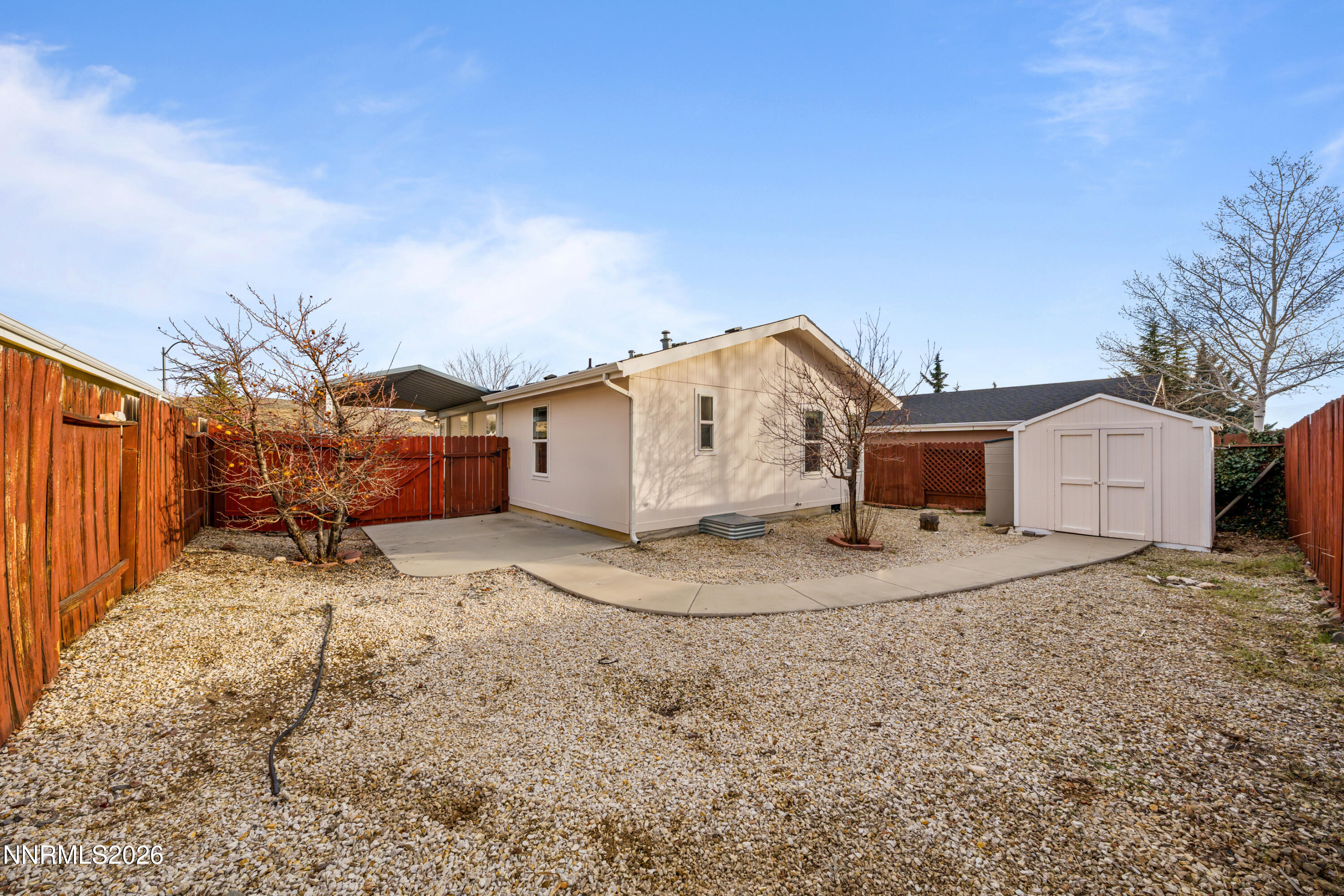 5277 Mt Dana Drive Reno, NV 89506 - Photo 32 of 49 a view of a house with a yard