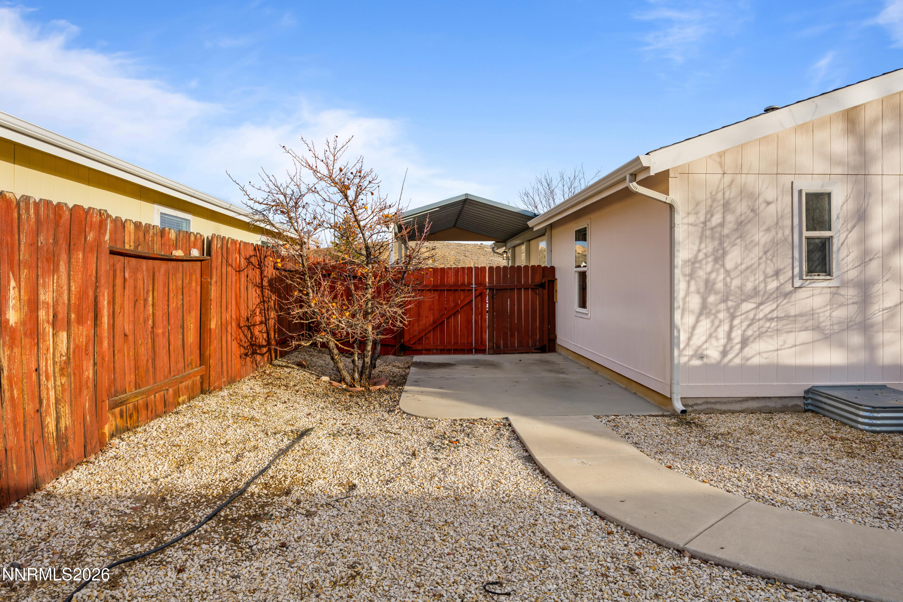 5277 Mt Dana Drive Reno, NV 89506 - Photo 35 of 49 a view of a house with a yard