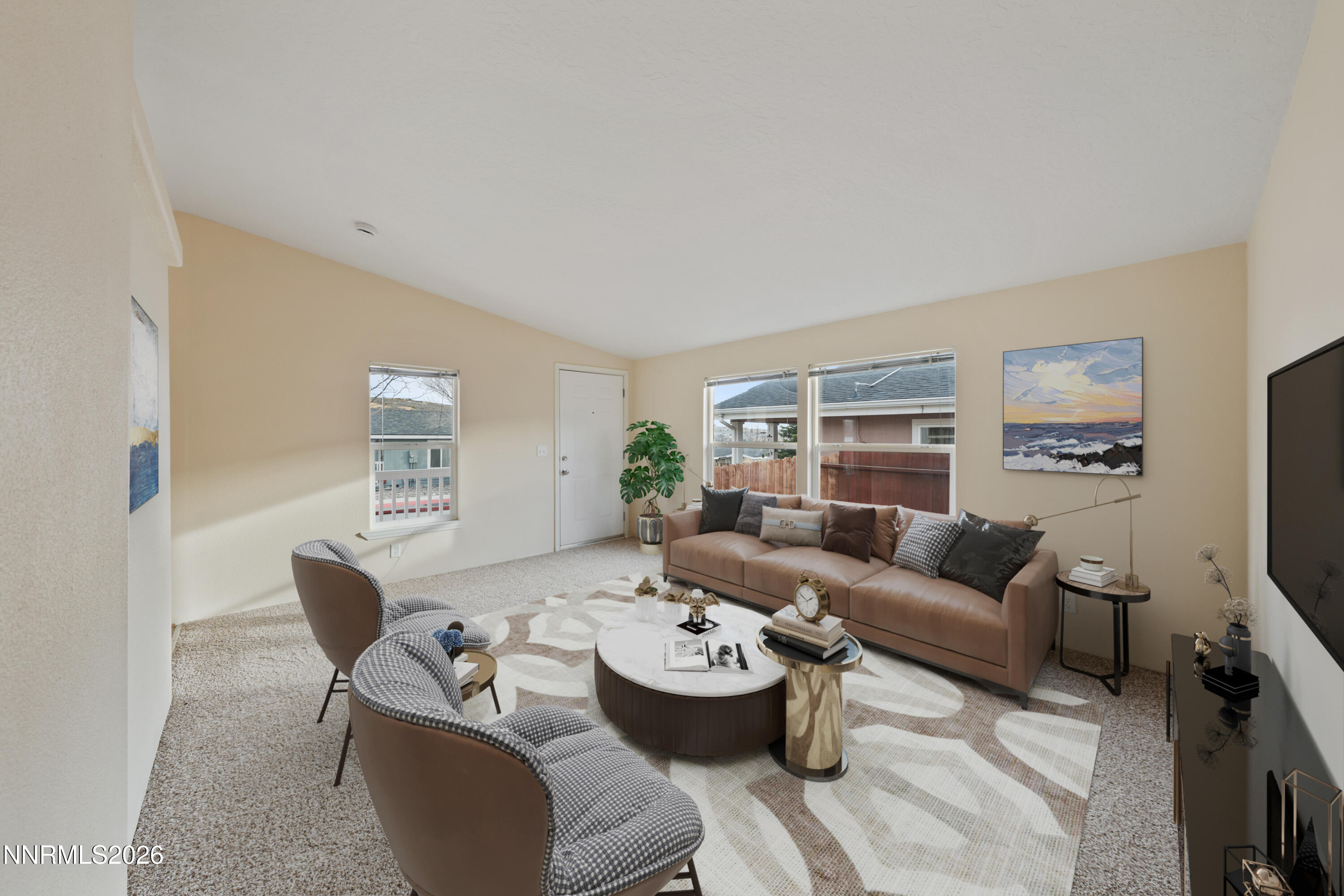 5277 Mt Dana Drive Reno, NV 89506 - Photo 4 of 49 a living room with furniture and a flat screen tv