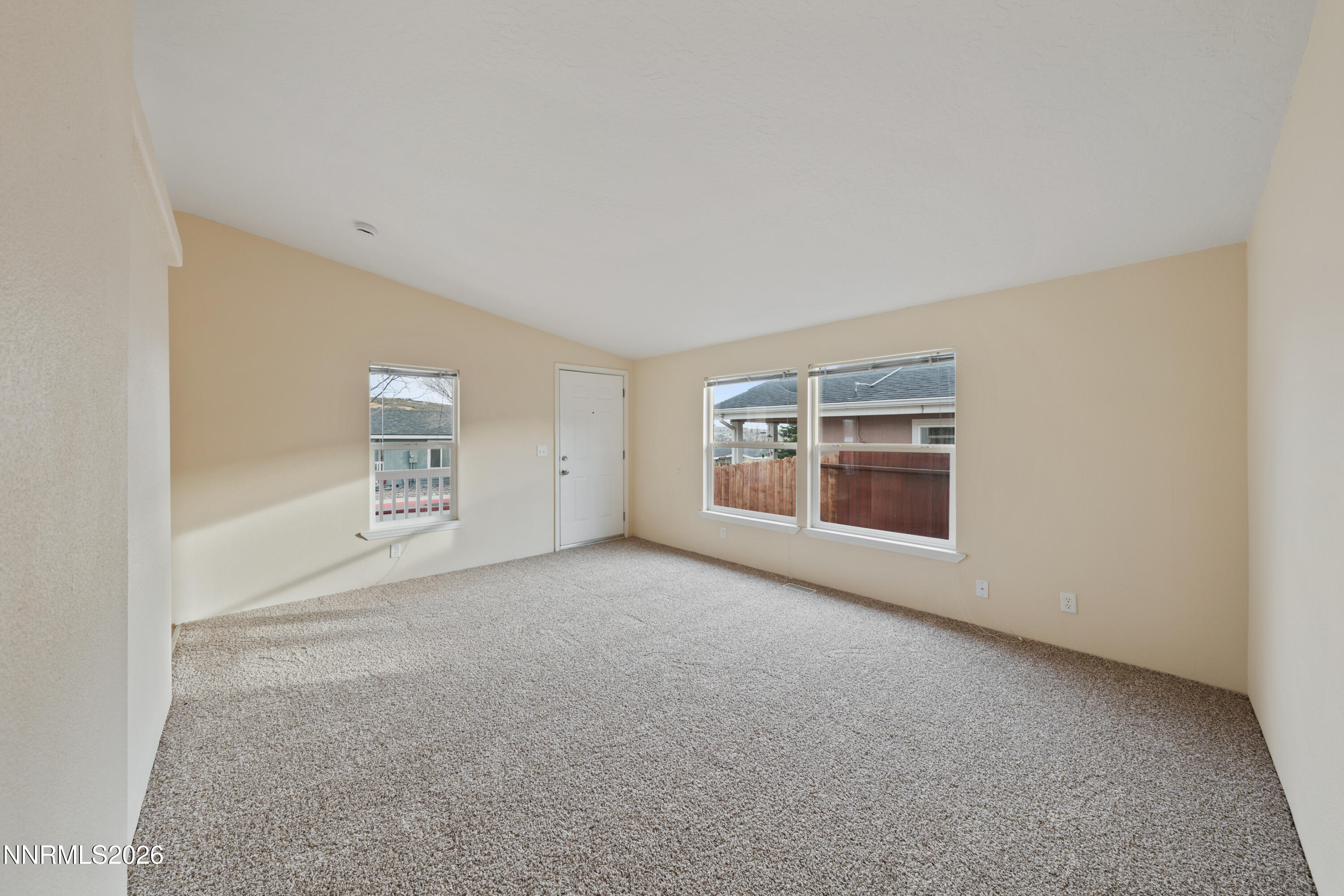 5277 Mt Dana Drive Reno, NV 89506 - Photo 5 of 49 an empty room with a empty space and window