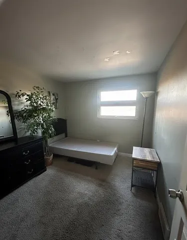 a view of balcony with wooden floor