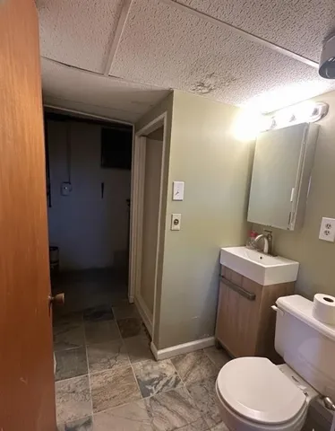 a room with a sink and a stove