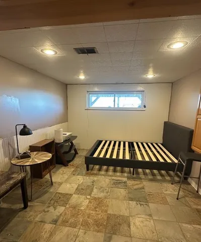 a living room with furniture and a couch