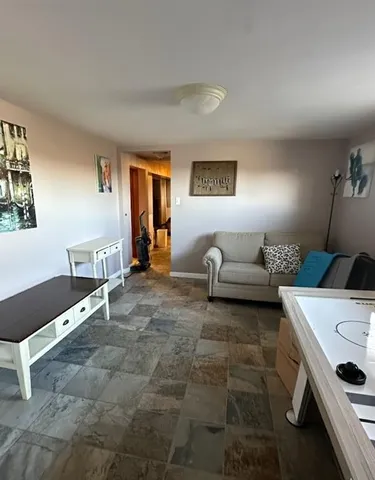 a kitchen with a stove and a cabinets