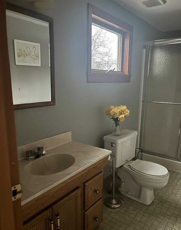 40 Grace Street Imperial, PA 15126 - Photo 24 of 24 a white toilet sitting next to a bathroom sink