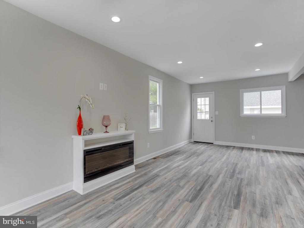 21 Homeland Road Pasadena, MD 21122 - Photo 14 of 41 Living Room Fireplace