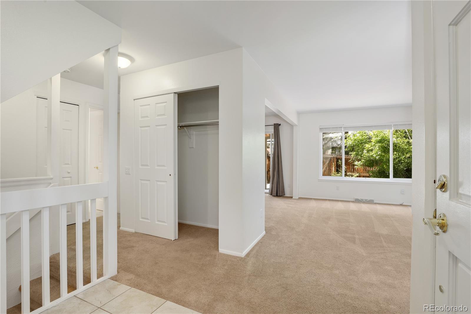 8760 Independence Way Arvada, CO 80005 - Photo 11 of 40 an empty room with windows