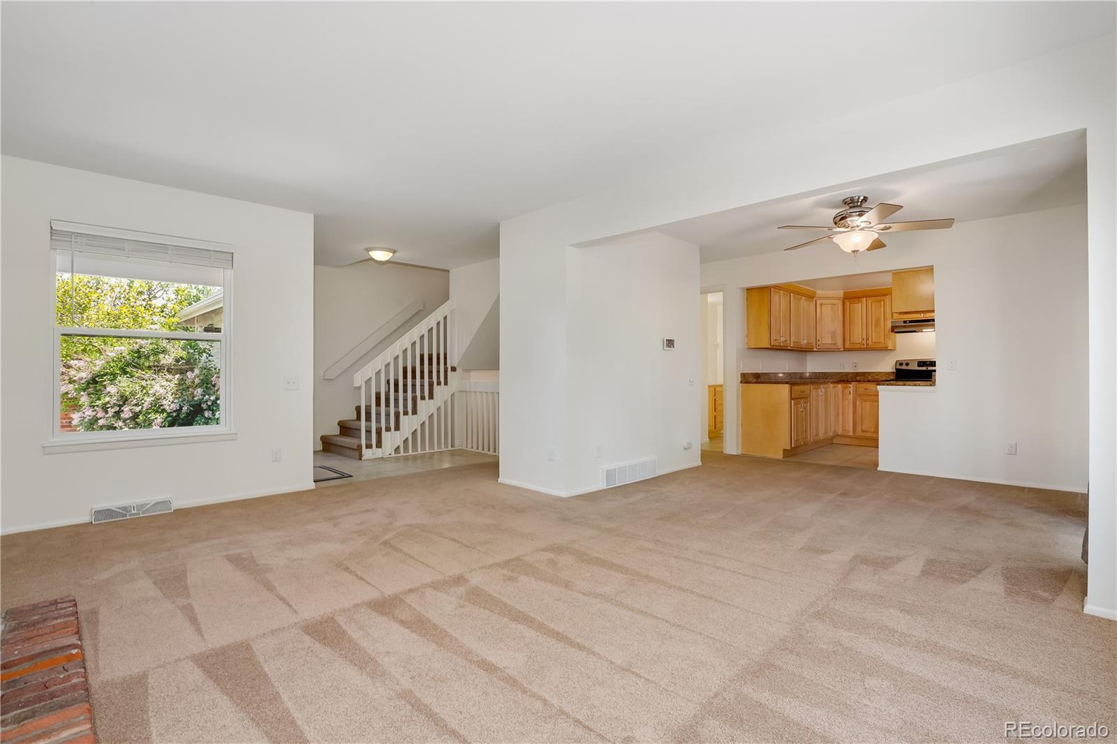 8760 Independence Way Arvada, CO 80005 - Photo 14 of 40 a view of an empty room with a window