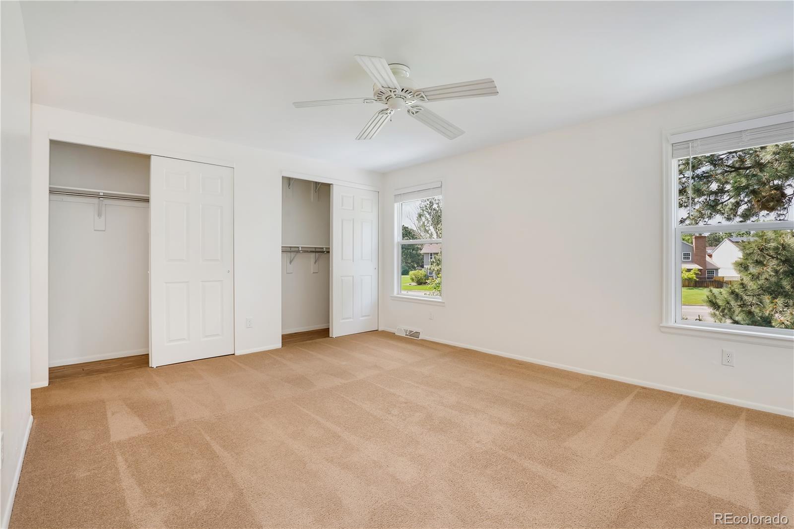 8760 Independence Way Arvada, CO 80005 - Photo 28 of 40 a view of an empty room with a window