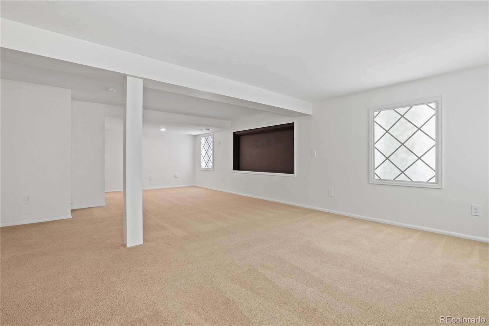 8760 Independence Way Arvada, CO 80005 - Photo 35 of 40 a view of an empty room with a window