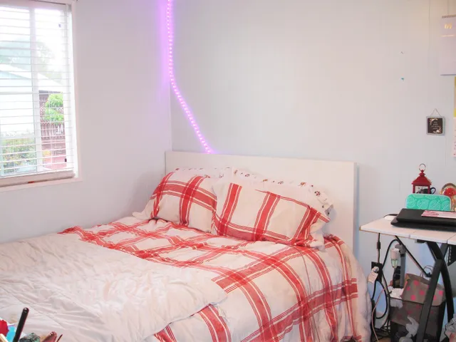 a bathroom with a sink mirror and toilet
