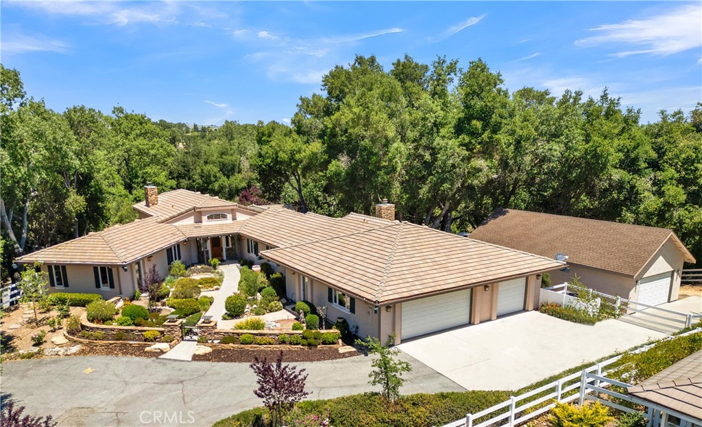 117 Frontier Way Templeton, CA 93465 - Photo 1 of 60 a view of a white house with a big yard and large tree
