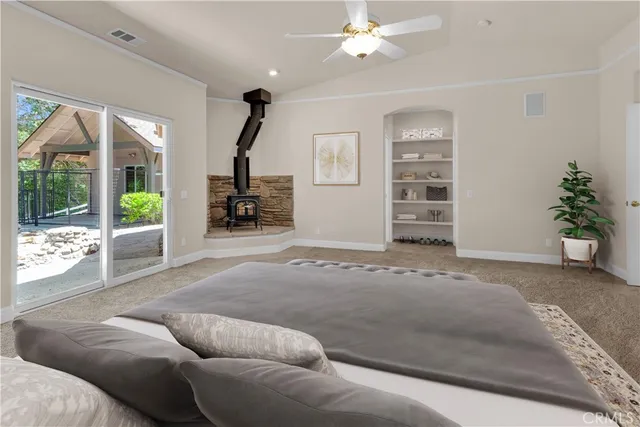 a spacious bathroom with a granite countertop sink mirror and bathtub