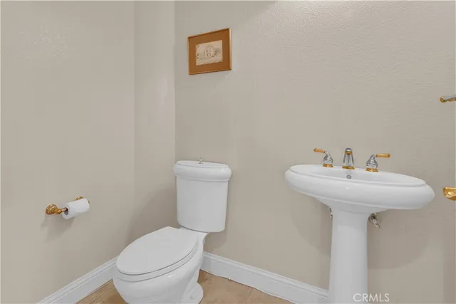 a view of an empty room and closet area