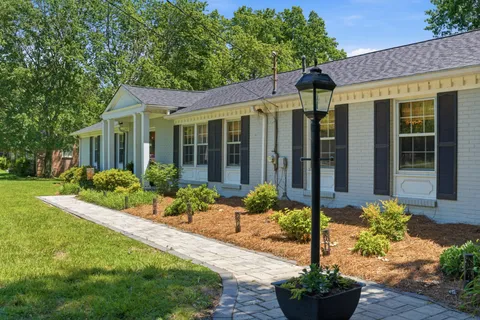 a front view of a house with a porch