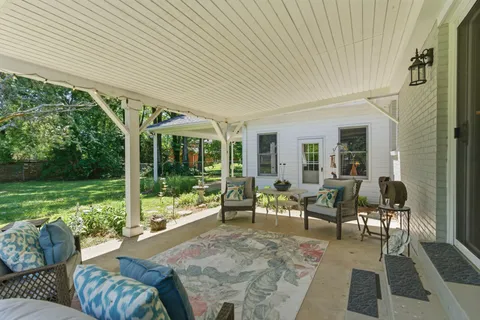 a outdoor space with furniture and garden view