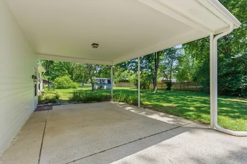 a view of a garden with an outdoor space