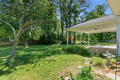 a view of a backyard with garden