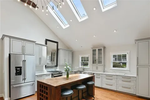 a bed room with a bed and a window