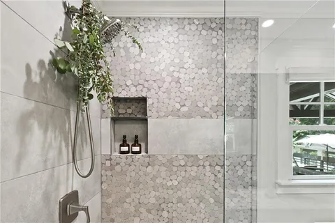 a view of a patio with table and chairs