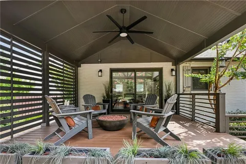 a sign that is sitting in a forest