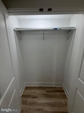 a view of small space with racks on the wall