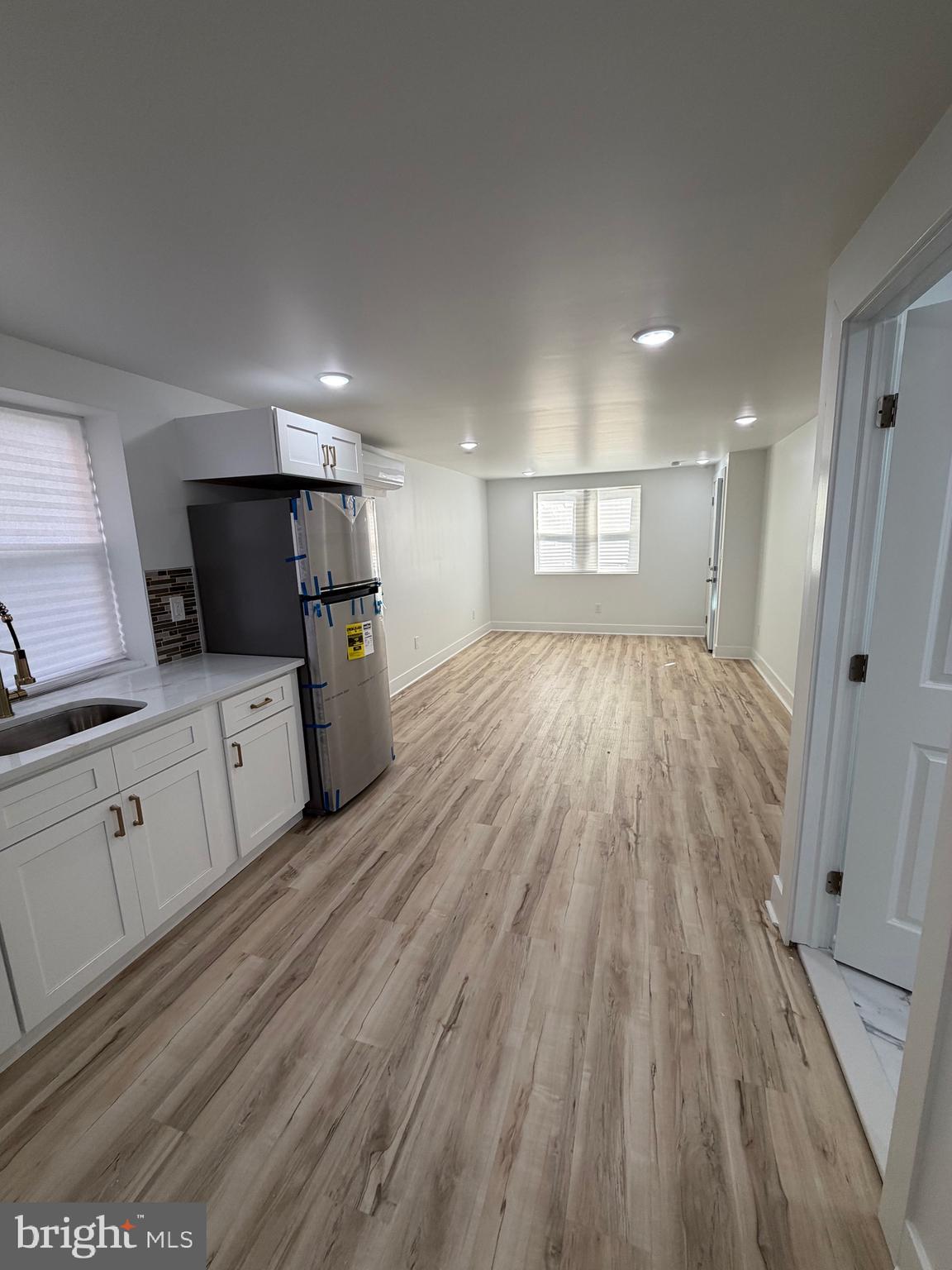 7810 Limekiln Pike, Unit 1 Philadelphia, PA 19150 - Photo 10 of 16 a view of a kitchen with electric appliances