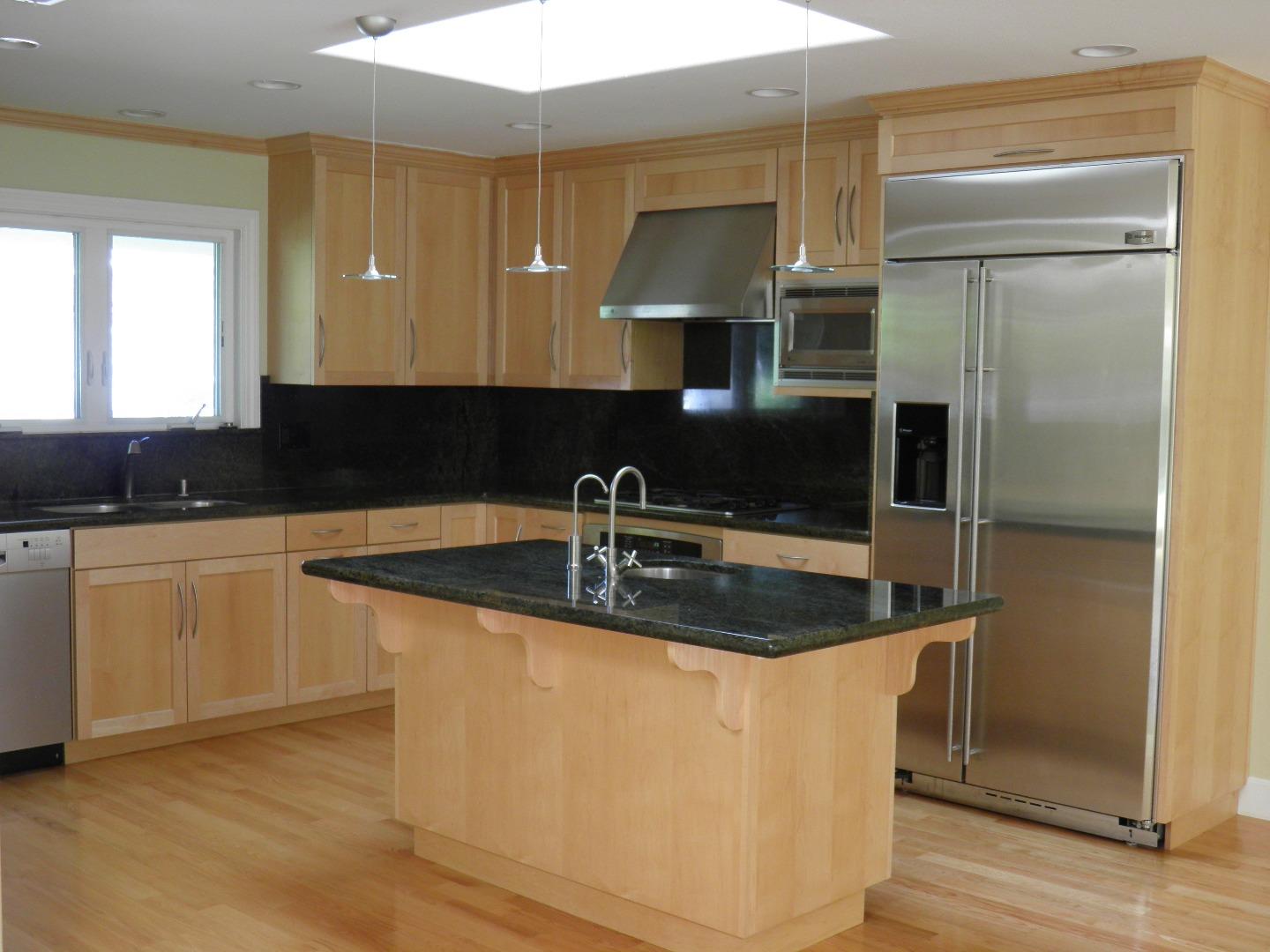 836 Springer Road Los Altos, CA 94024 - Photo 3 of 9 a kitchen with stainless steel appliances granite countertop a sink a stove and a refrigerator
