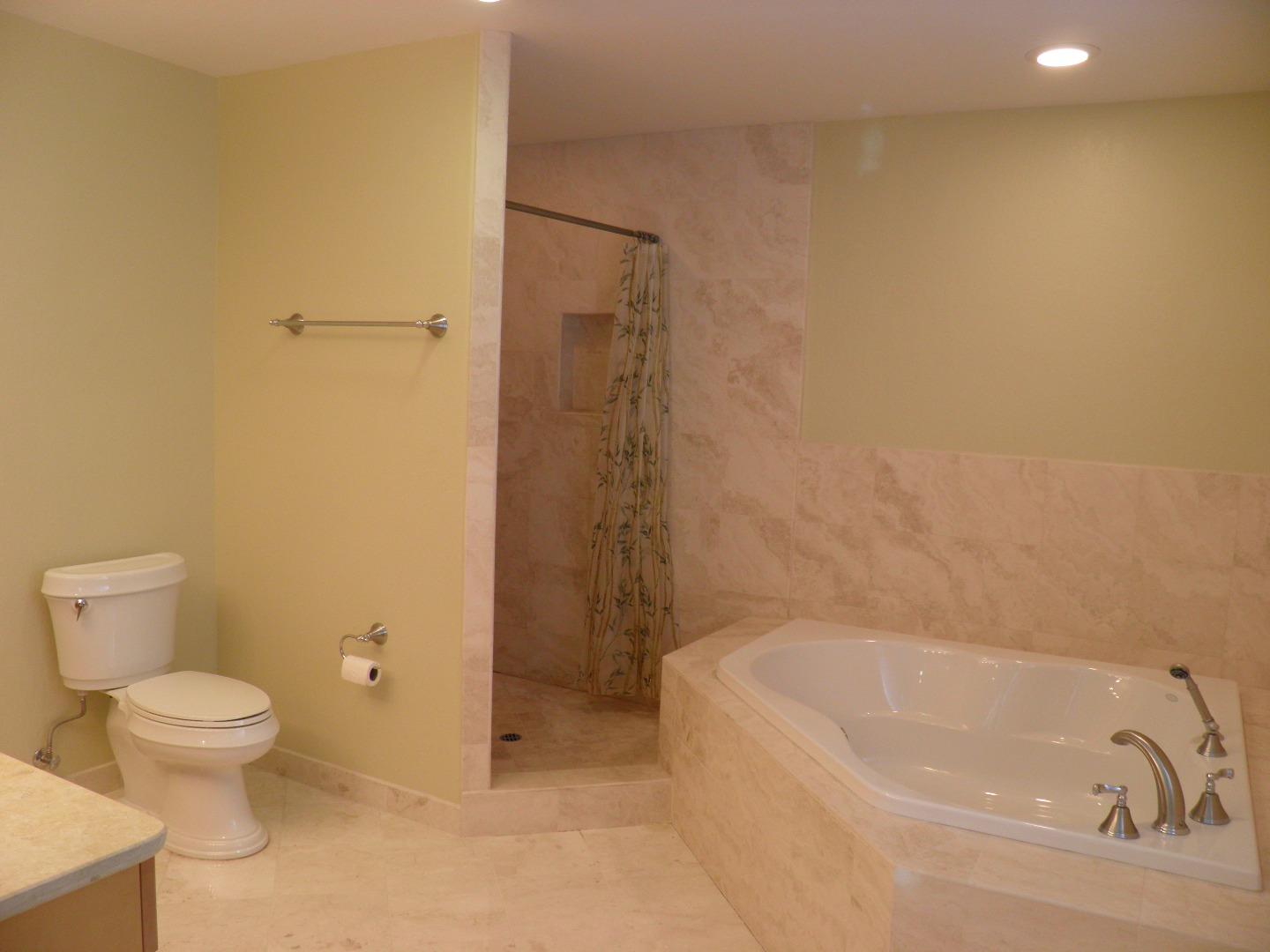 836 Springer Road Los Altos, CA 94024 - Photo 5 of 9 a bathroom with a bathtub and a toilet