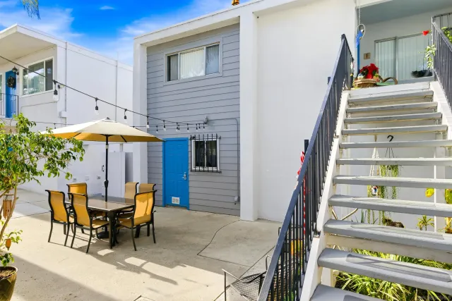a view of a tables and chairs in patio