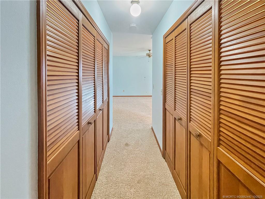 735 Southwest Salerno Road Stuart, FL 34997 - Photo 16 of 27 a view of a hallway with a door