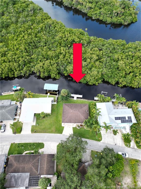 735 Southwest Salerno Road Stuart, FL 34997 - Photo 27 of 27 an aerial view of a house