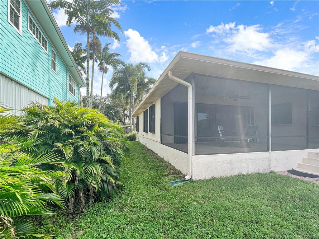 735 Southwest Salerno Road Stuart, FL 34997 - Photo 9 of 27 a view of a small garden