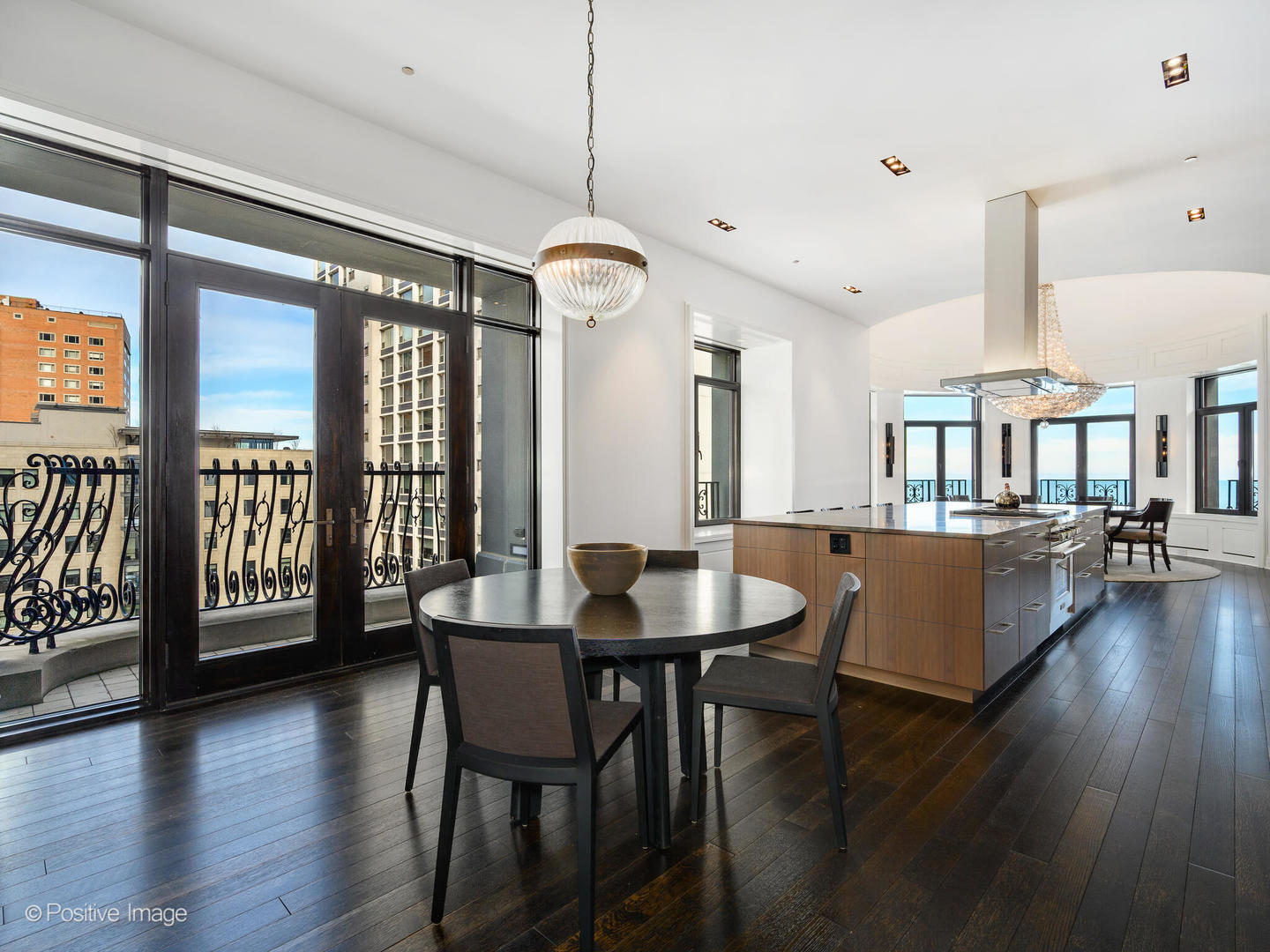 65 East Goethe Street, Unit 8N Chicago, IL 60610 - Photo 11 of 53 a view of a a dining room with furniture window and wooden floor