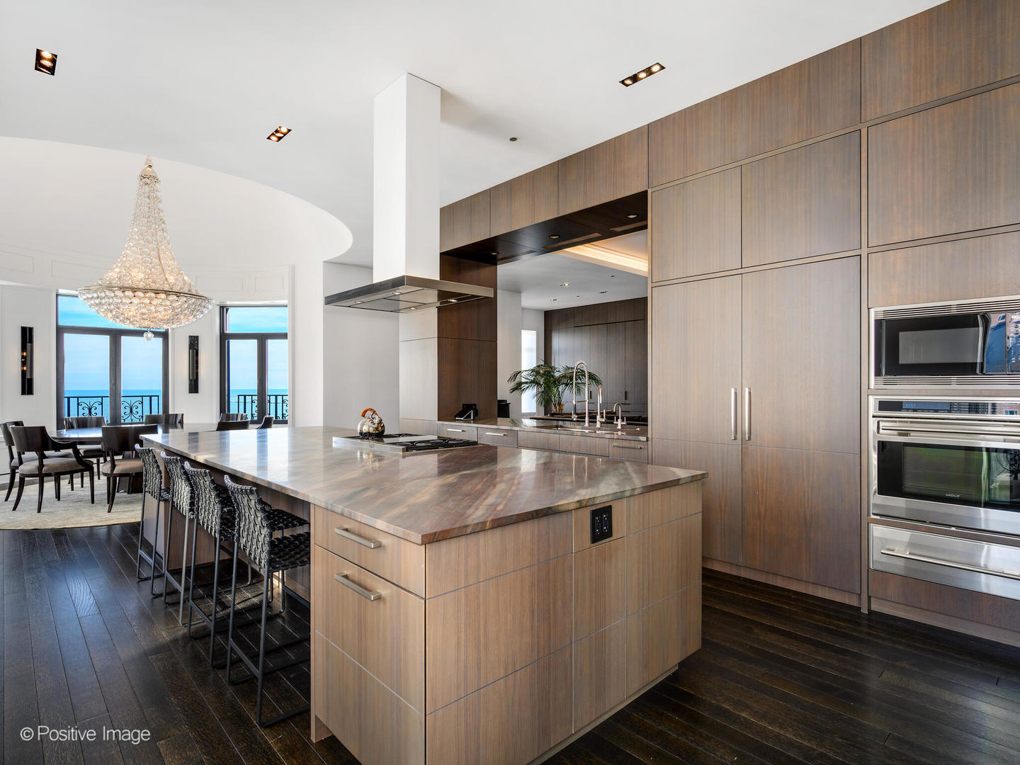 65 East Goethe Street, Unit 8N Chicago, IL 60610 - Photo 12 of 53 a kitchen with stainless steel appliances granite countertop a sink and a refrigerator