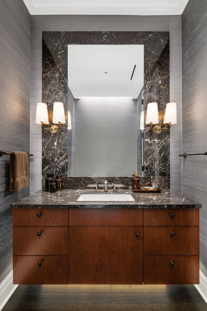 65 East Goethe Street, Unit 8N Chicago, IL 60610 - Photo 21 of 53 a bathroom with a sink and a mirror