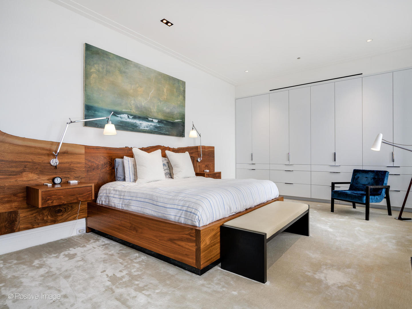 65 East Goethe Street, Unit 8N Chicago, IL 60610 - Photo 24 of 53 a spacious bedroom with a bed and a flat screen tv