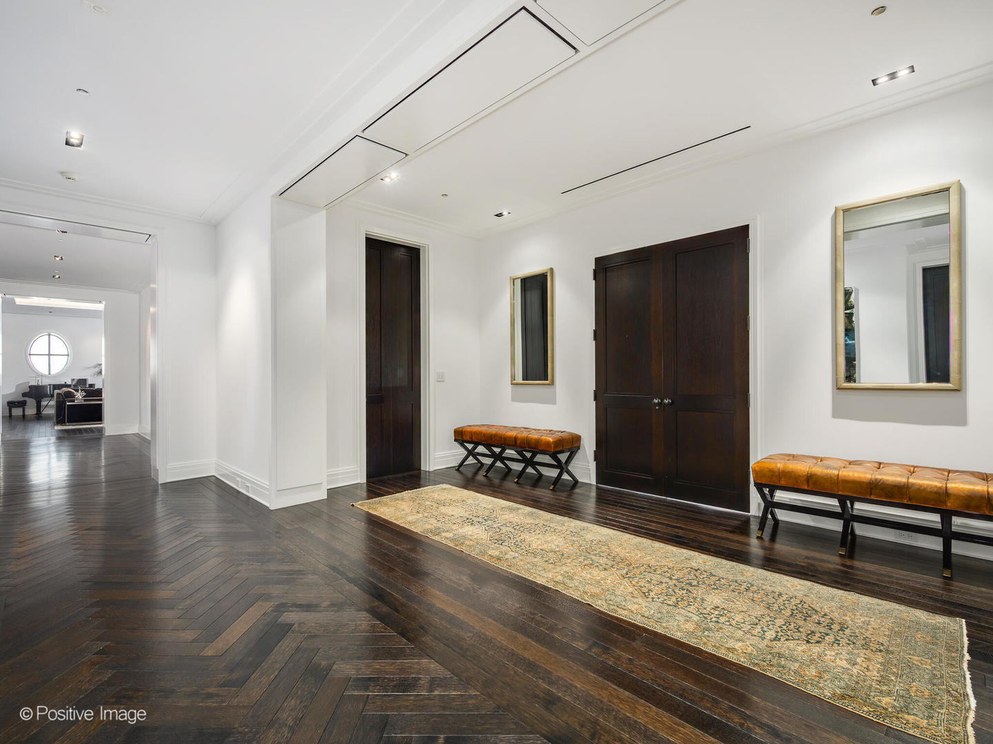 65 East Goethe Street, Unit 8N Chicago, IL 60610 - Photo 3 of 53 a bedroom with furniture and a rug