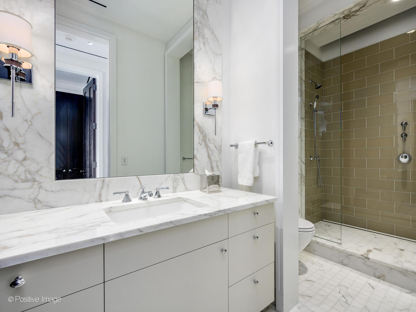 65 East Goethe Street, Unit 8N Chicago, IL 60610 - Photo 31 of 53 a bathroom with a sink and a mirror