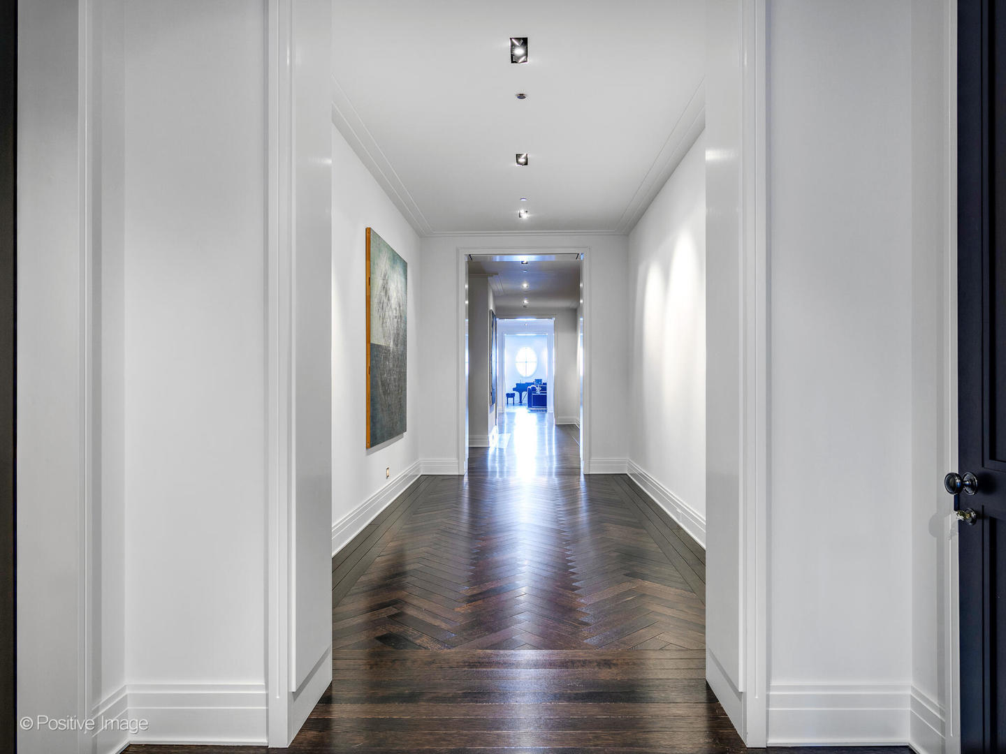 65 East Goethe Street, Unit 8N Chicago, IL 60610 - Photo 37 of 53 a view of a hallway with wooden floor