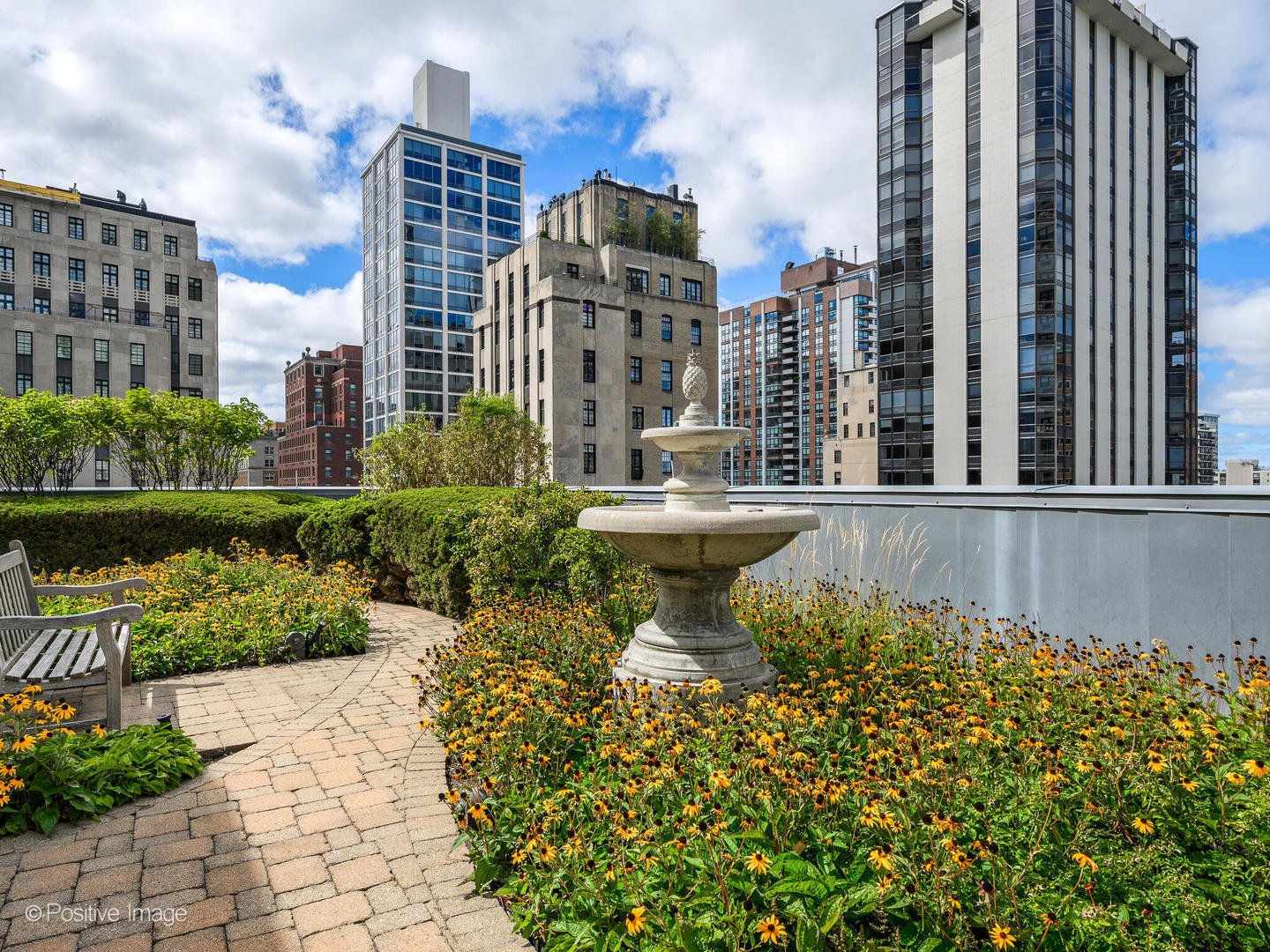 65 East Goethe Street, Unit 8N Chicago, IL 60610 - Photo 47 of 53 a view of a water with a building and bench in the background