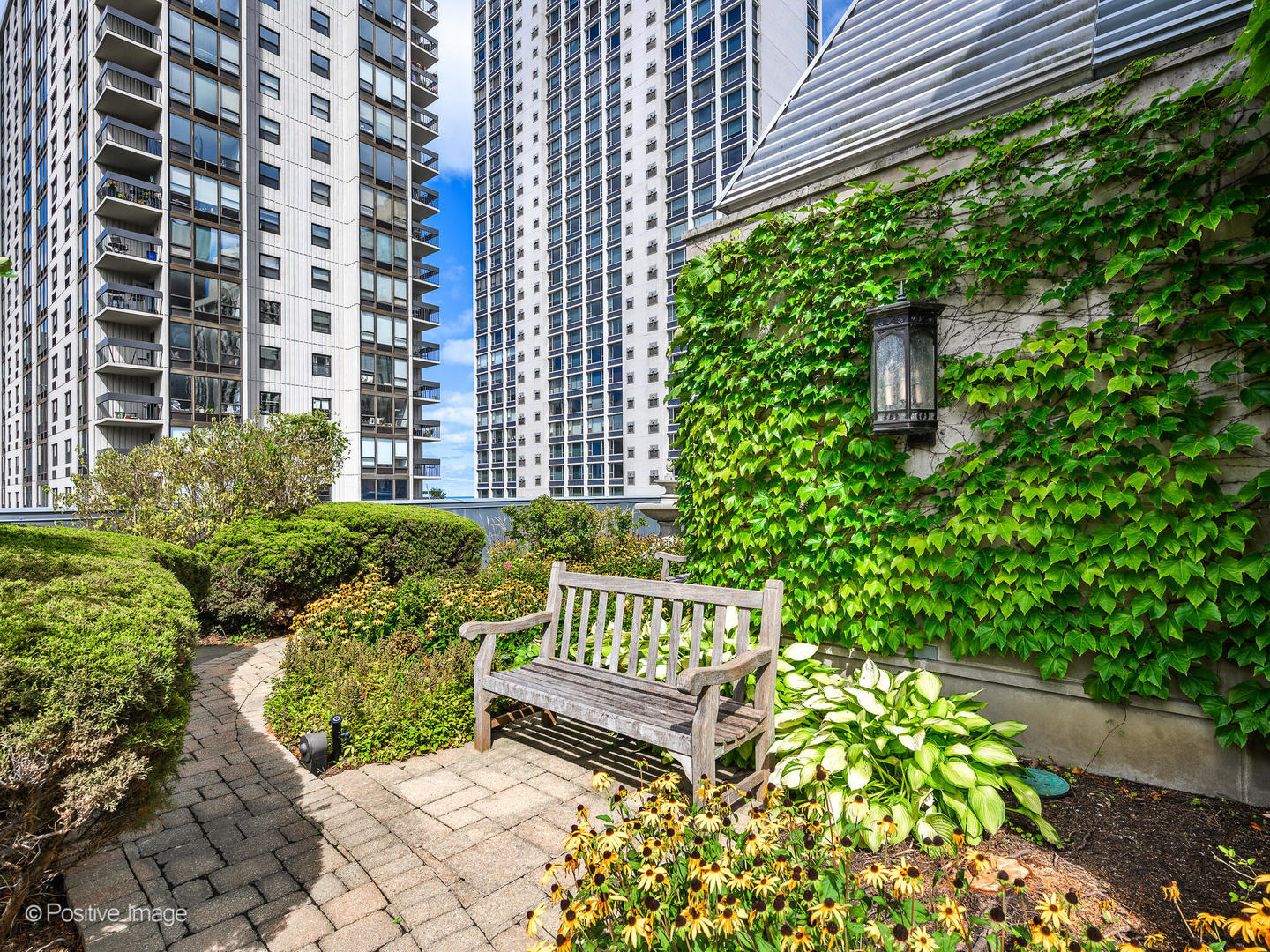 65 East Goethe Street, Unit 8N Chicago, IL 60610 - Photo 52 of 53 a view of a garden with potted plants