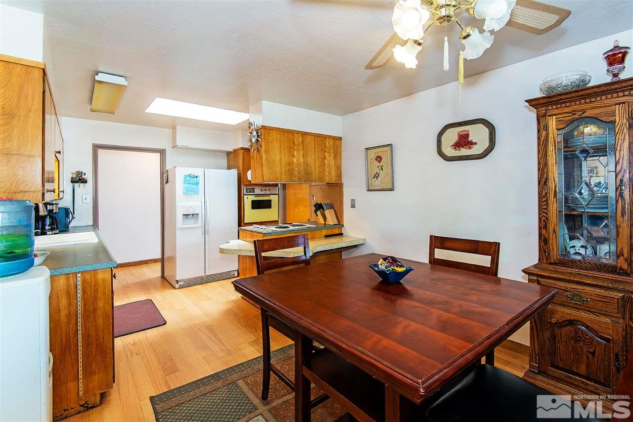 1400 Roberts Street Reno, NV 89502 - Photo 6 of 19 a view of a dining room with furniture and a chandelier