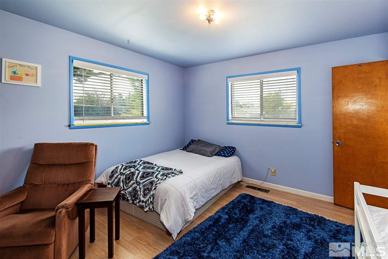 1400 Roberts Street Reno, NV 89502 - Photo 9 of 19 a bedroom with bed and a window