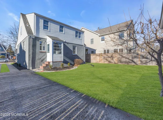 a front view of house with yard