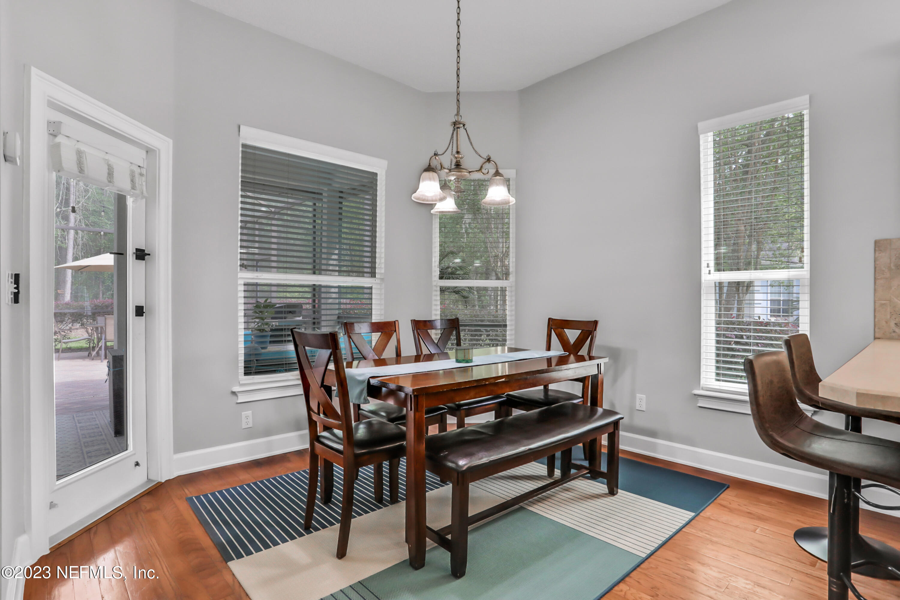 212 Twining Trace St. Johns, FL 32259 - Photo 11 of 60 a dining room with furniture window and wooden floor