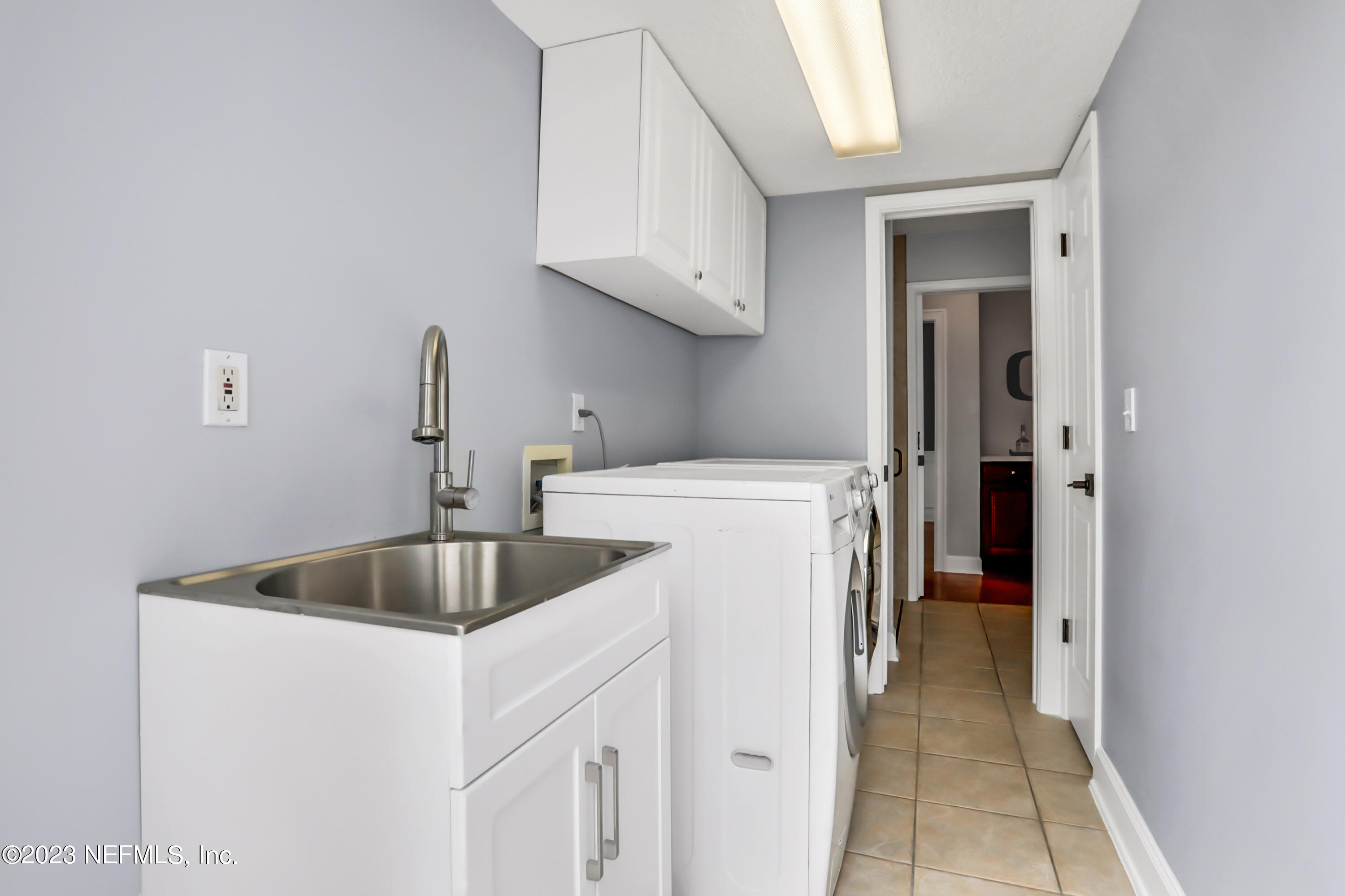 212 Twining Trace St. Johns, FL 32259 - Photo 20 of 60 a kitchen with a sink and cabinets