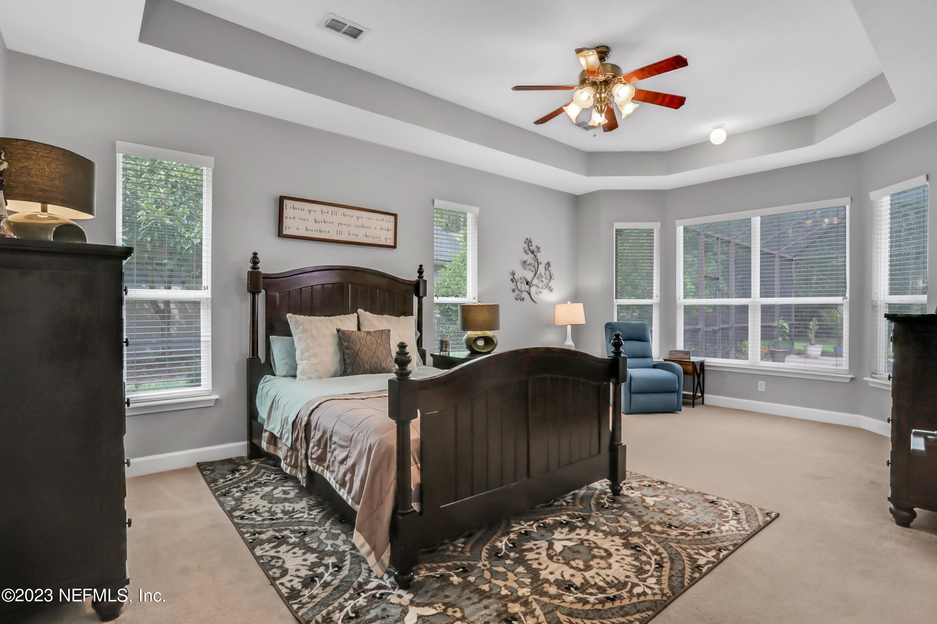 212 Twining Trace St. Johns, FL 32259 - Photo 21 of 60 a bedroom with a bed furniture and a window