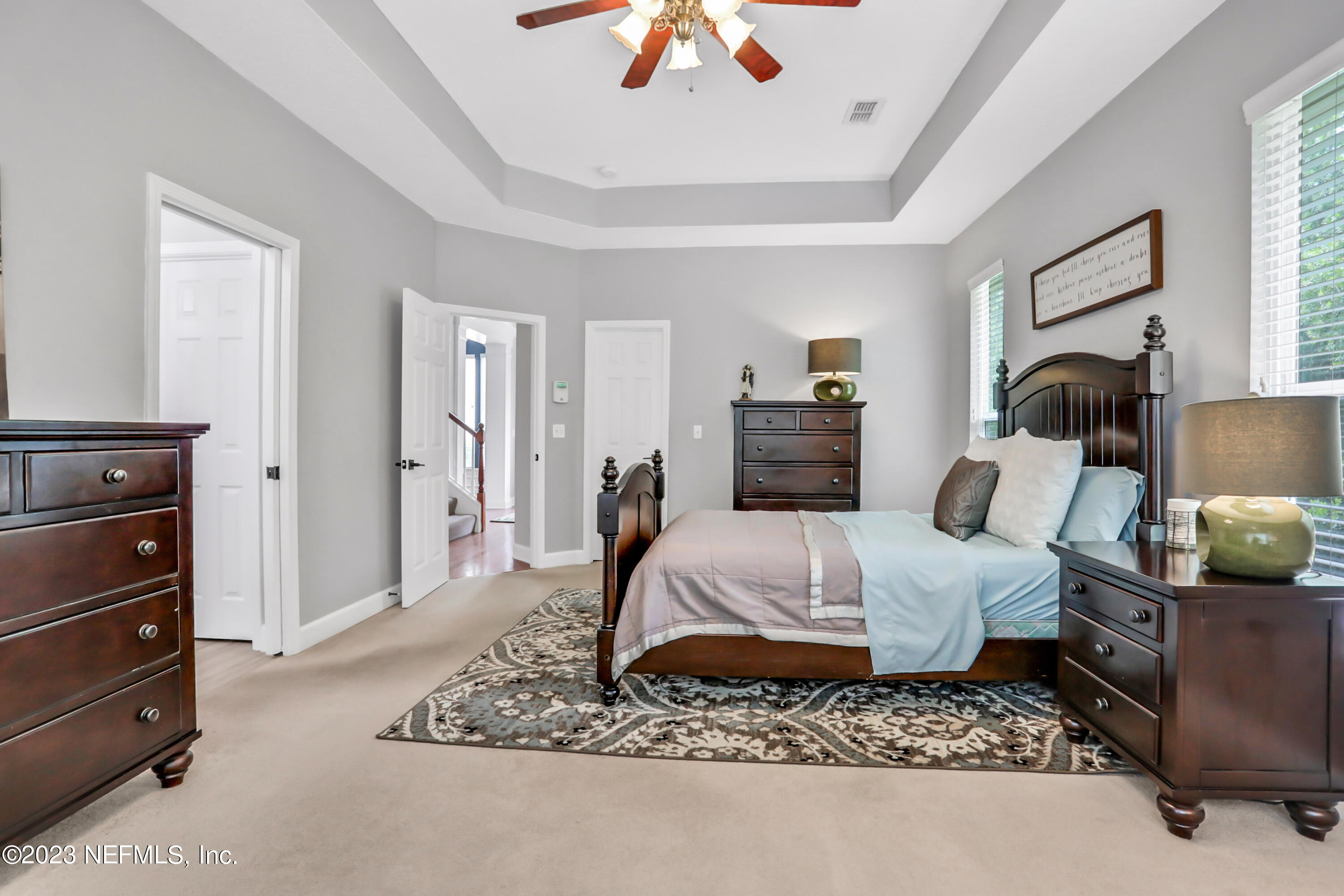 212 Twining Trace St. Johns, FL 32259 - Photo 22 of 60 a living room with furniture and a rug