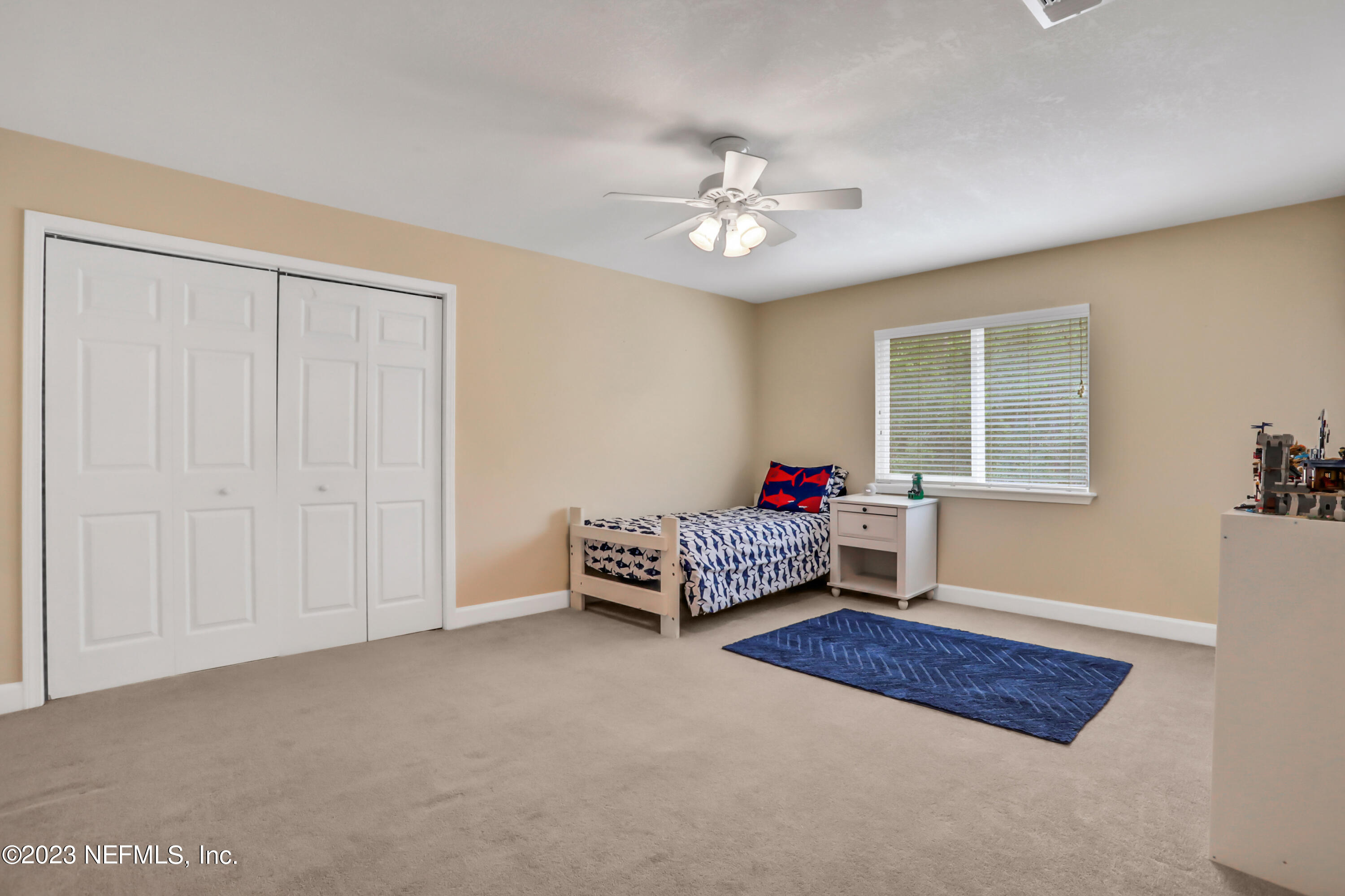 212 Twining Trace St. Johns, FL 32259 - Photo 28 of 60 a living room with furniture and a window